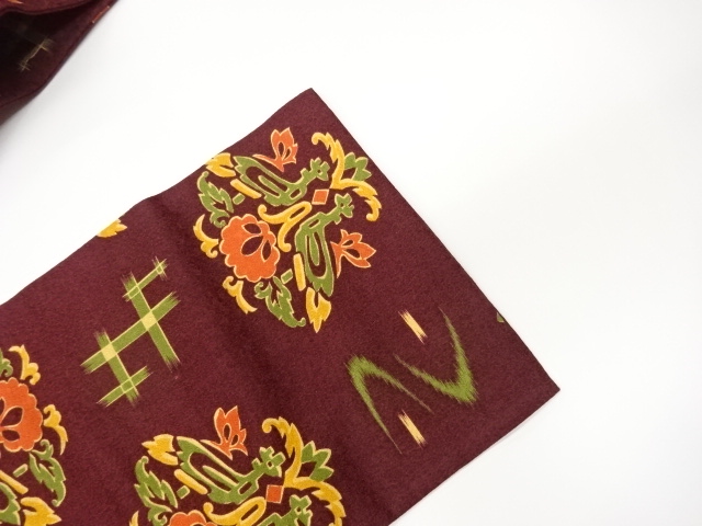  抽象草花模様織出し名古屋帯